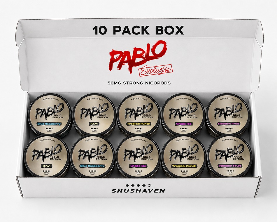 An open white 10-pack box of Pablo Exclusivo 50mg Strong Nicodaps tins by Snushaven, showing ten round metal tins arranged in two rows on a white background.